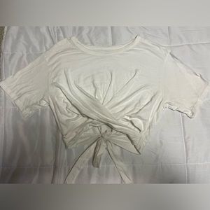 Small, white classic behind the back tie tshirt from AERIE.